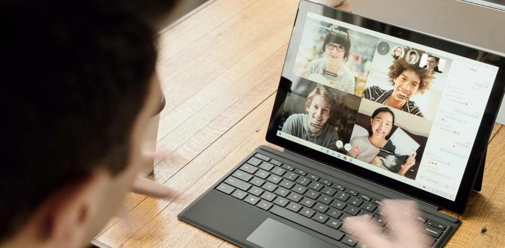 Image of an instructor communicating with students on a video call