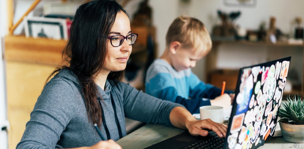 A Higher Education student filling out an online assessment from home