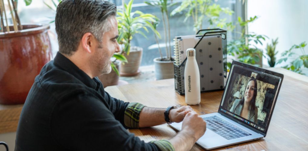 Man and woman working on Zoom call
